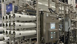 High-recovery reverse osmosis system with membrane housings and control panel